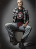 Black and red plaid flannel shirt with a graphic tee underneath