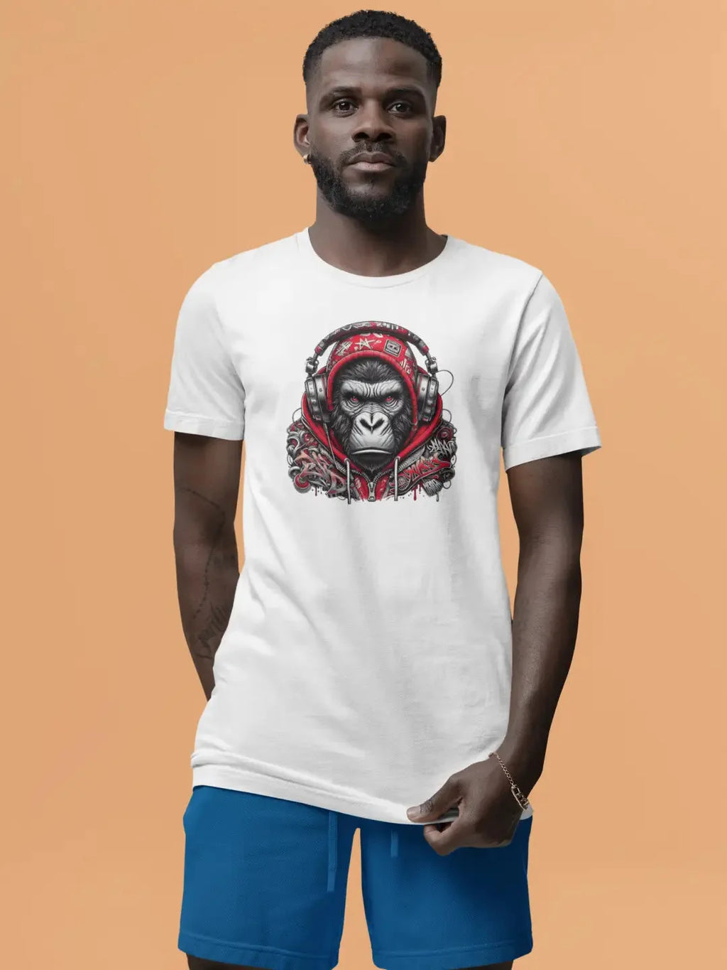 White t-shirt with graphic design of a gorilla wearing headphones and red accents