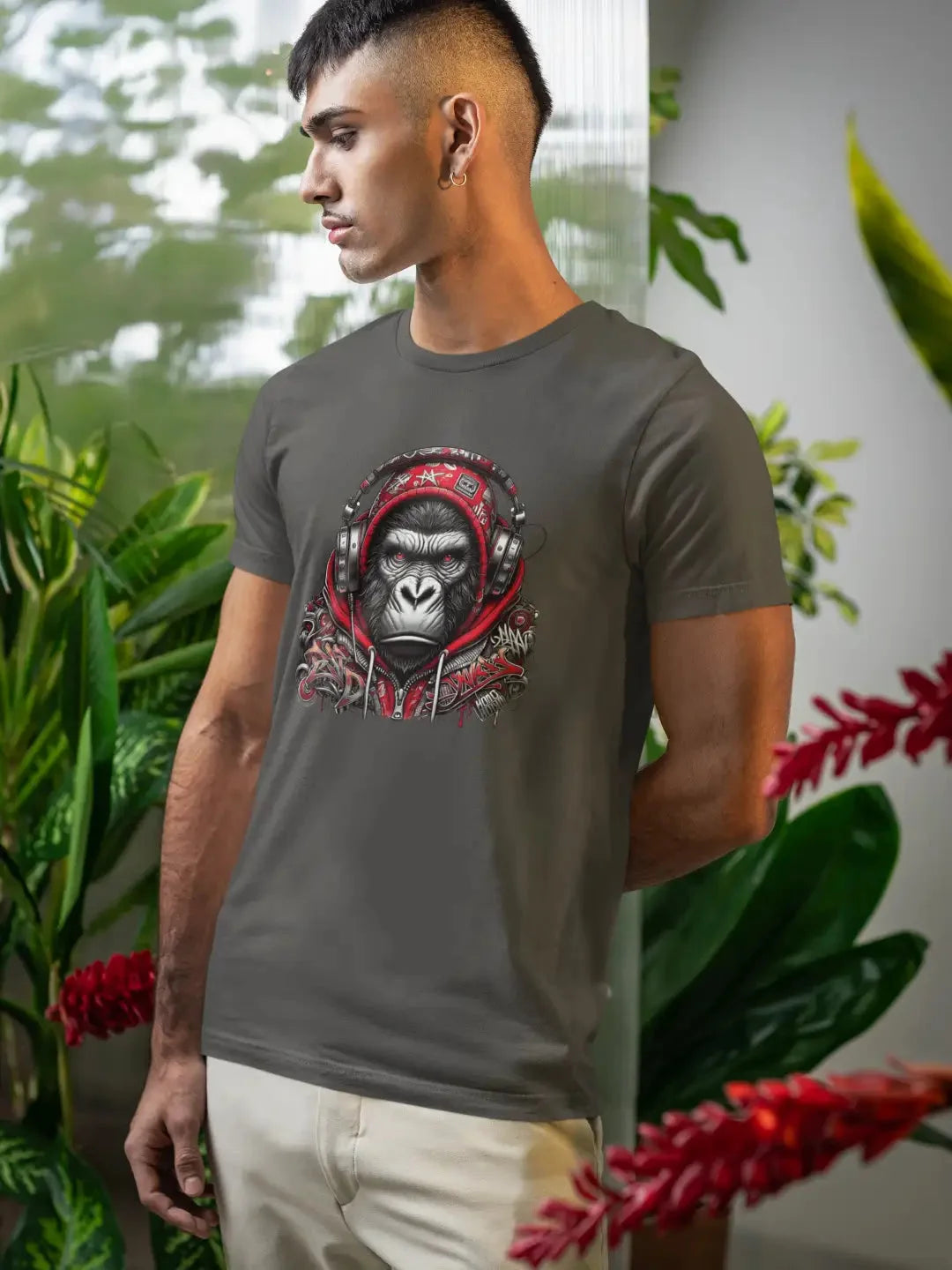 Charcoal gray t-shirt with a vibrant red and black graphic design of an ape face, made from soft cotton