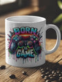 White ceramic mug with ’Born to Game’ graphic