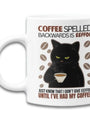 White ceramic coffee mug with a black cat design
