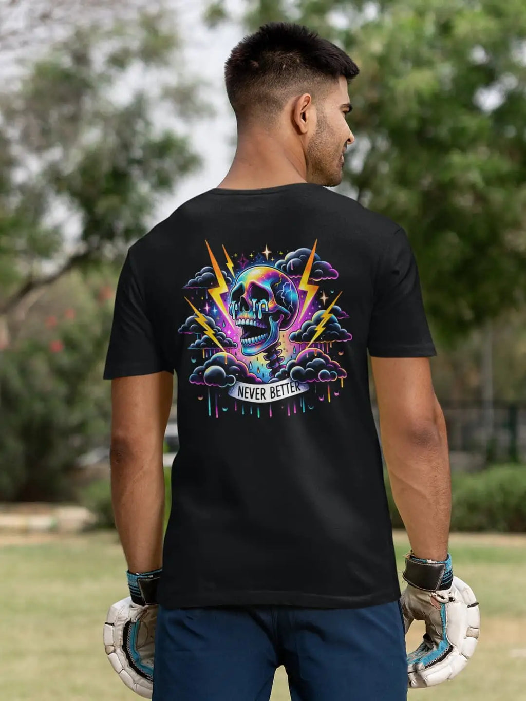 A black t-shirt with a colorful, neon-style skull and lightning bolt graphic on the back.