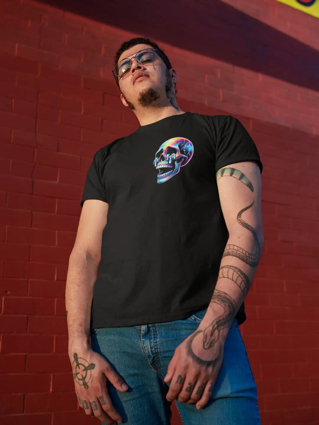 Black t-shirt with a colorful skull design on the left chest.